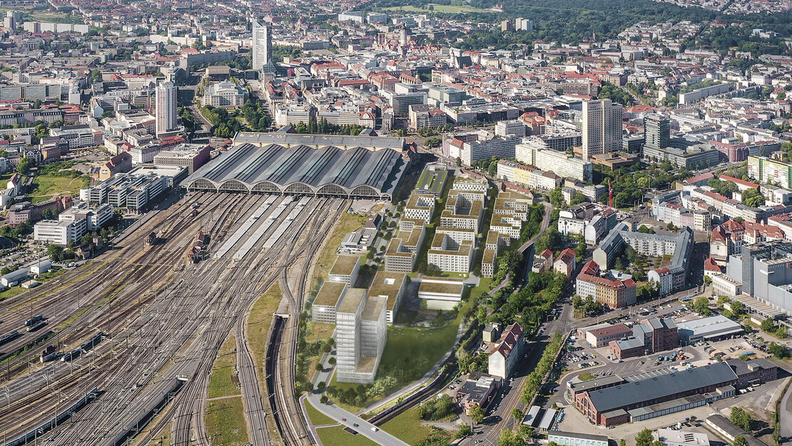 Luftbildaufnahme des Leipziger Hauptbahnhof von Norden gesehen mit Simulation eines benachbarten Neubauquartiers.